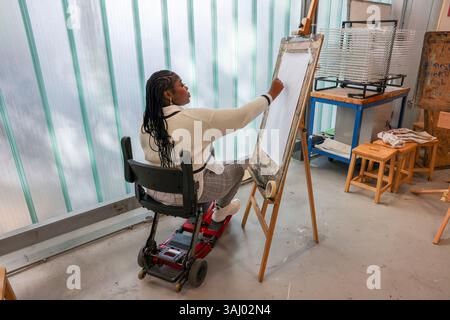 Disabled woman drawing at art classes Stock Photo