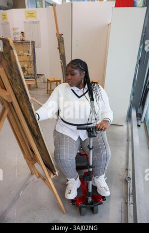 Disabled woman drawing at art classes Stock Photo