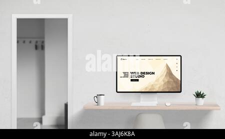 Creative agency workspace featuring web studio homepage on monitor, minimalist desk and open office door adding depth to the scene Stock Photo