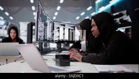Cyber Criminals Stealing Secure Data And Information. Programmer Hacking Software. Spy Hacker Stealing Secure Data Stock Photo