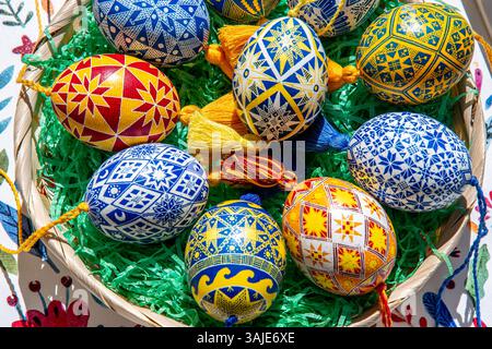 A collection of beautiful Easter eggs, each intricately decorated with traditional Ukrainian pysanky designs. Stock Photo