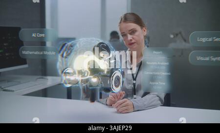Female Engineer Uses Advanced Augmented Reality to Visualize 3D Holographic Model of Cybernetic Brain in Futuristic Office. Virtual Visualization of Artificial Intelligence Based Software Interface. Stock Photo