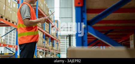 Asian male factory inspect and check inventory on warehouse, count stock product. Transport logistic business shipping, delivery to customers. inspect Stock Photo