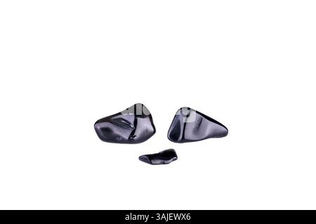 black obsidian chips isolated on white background Stock Photo