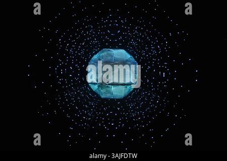 Futuristic glowing blue geometric sphere with floating particles Stock Photo