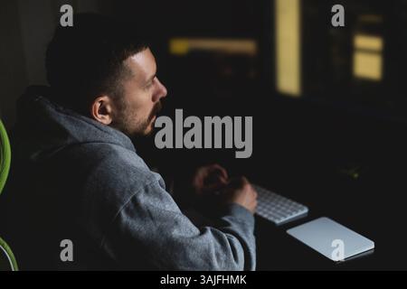 Programmer codes from home. Remote work Stock Photo