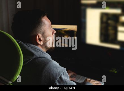 Programmer codes from home. Remote work Stock Photo