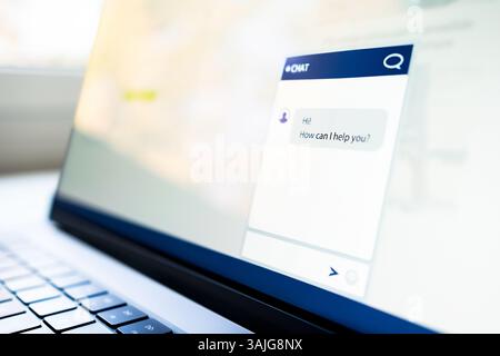 Chat with customer. AI chatbot. Support contact help center website on laptop computer screen. Live helpdesk service with bot or human. Stock Photo
