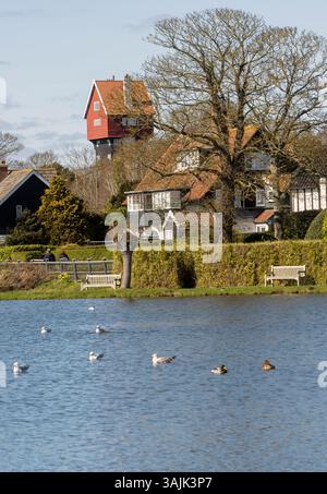 The Meare with the House in the Clouds in the background, Thorpeness, Suffolk, East Anglia, England, UK Stock Photo
