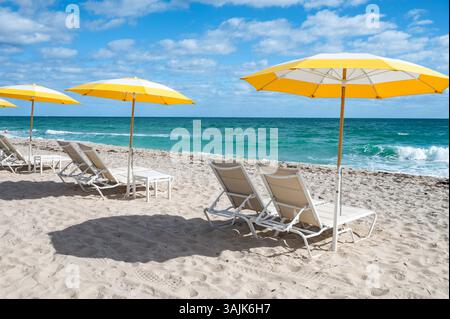 Fort Lauderdale Beach Chairs and Umbrellas. Sea View Stock Photo