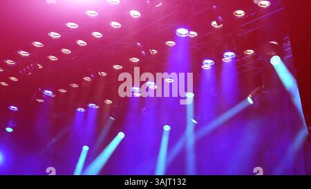 musical concert stage light, spotlights working during the concert with Stage fog Stock Photo
