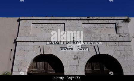 Grand Casemates Gates, a historical landmark in Gibraltar, bearing inscriptions commemorating Lieutenant General Sir John Adye and General John Earl o Stock Photo