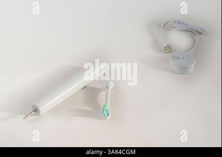 Electric sonic toothbrush isolated on white background Stock Photo