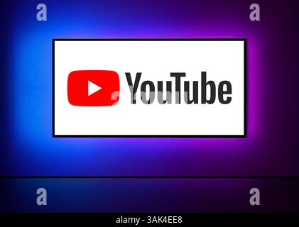 The YouTube logo displayed on a TV screen, with a vibrant neon purple and blue gradient background. NY, NY-USA - Marth 21 2025. Stock Vector