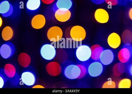 Bright Multicolored Bokeh Circles in Defocused Abstract Background, Vibrant Festive Lights Stock Photo