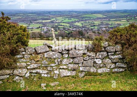 Drystone wall on the lower slopes of Cosdon Hill above the Devon village of south Zeal.  Dartmoor National Park, England, UK. Stock Photo