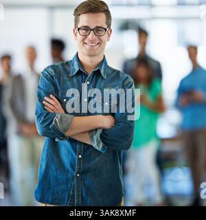 Crossed arms, smile and portrait of man in office with leadership, positive and confident attitude. Happy, professional and male web developer with Stock Photo