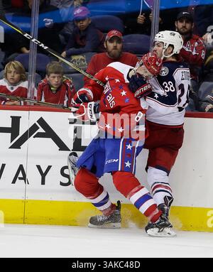 Washington Capitals center Boone Jenner (22) and Buffalo Sabres ...
