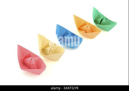 Colorful folder paper boats isolated over white Stock Photo