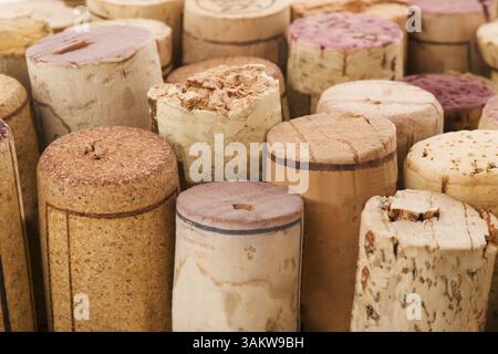 Many used corks from wine bottles in different sizes Stock Photo