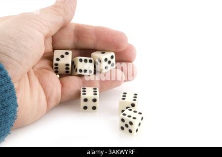 Hand throwing dices with good luck Stock Photo