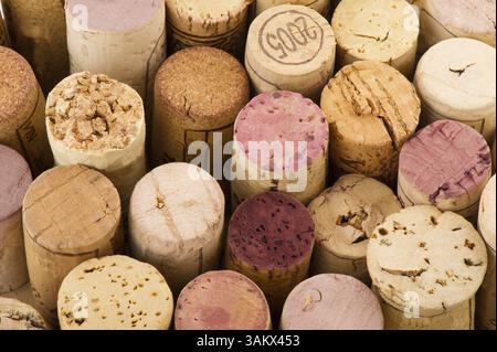 Many used corks from wine bottles in different sizes Stock Photo