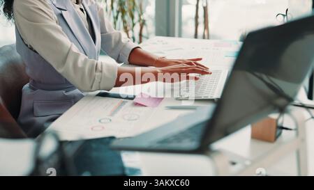 Hands, receptionist or woman typing on computer for office appointment, schedule or graphs. Charts, secretary and assistant in business with Stock Photo