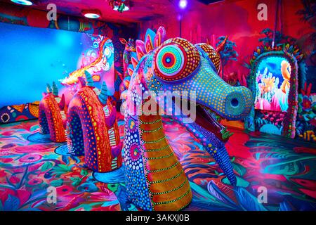 Psychedelic Fantasy Creatures in Immersive Art Exhibit Eye-Level View Stock Photo