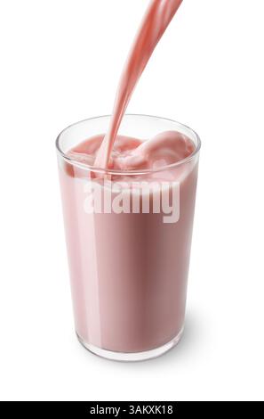 strawberry milk pouring into glass isolated on white background Stock Photo