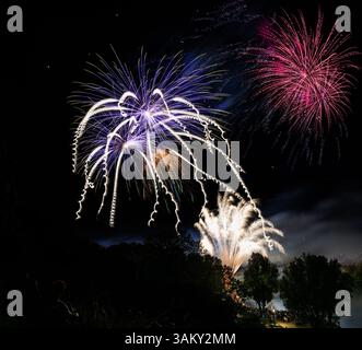 Firework display on the night sky at a festival Stock Photo