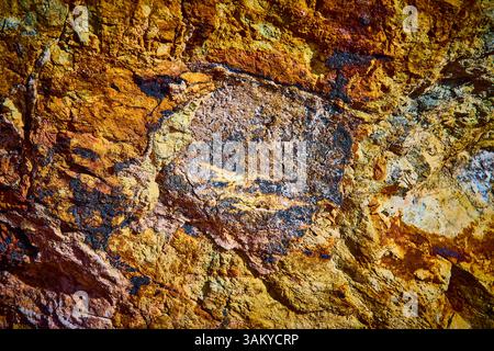 Textured Rock Surface with Earthy Tones Close-Up in Bootleg Canyon Stock Photo