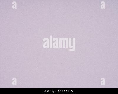 A subtle embrace of lilac whispers, the paper's texture a canvas for the gentle play of imagination Stock Photo