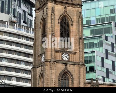The Church of Our Lady and Saint Nicholas is the Anglican parish church of Liverpool with modern buildings in background Stock Photo