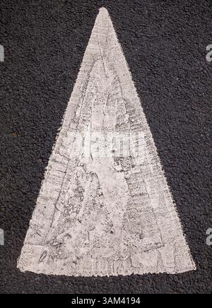 Painted Arrow Detail on Road Tarmac Stock Photo