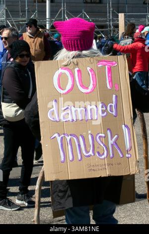 A sign Out Damned Musk at the Hands Off protest demonstration at the State Capitol in St. Paul, Minnesota April 5, 2025. Stock Photo