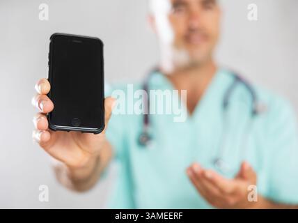 Doctor employs modern communication Stock Photo