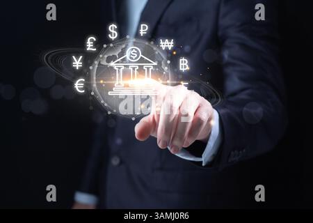 Businessman touching central bank on global online banking icon for money transfers and currency exchanges between countries of the world Stock Photo