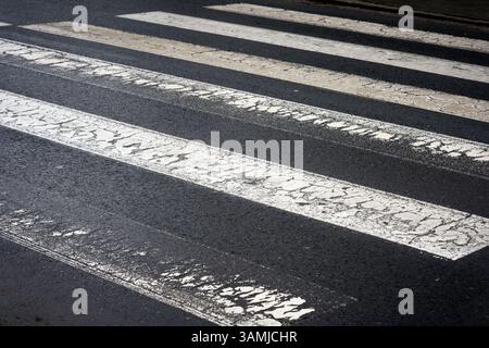 old weathered crosswalk in the traffic of the Polish city of Swinoujscie Stock Photo