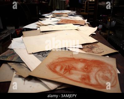 Forgotten faces and paper memories in the antique shop, Brooklyn Stock Photo