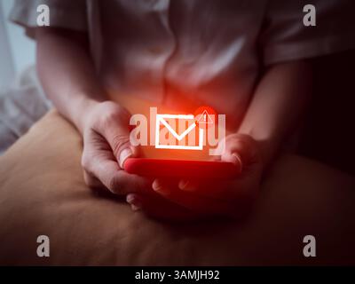 Scam alert concept, fraud sms, phishing from scammer. System hacked, red warning alert, email hack, spam text malware spreading virus on message alert Stock Photo