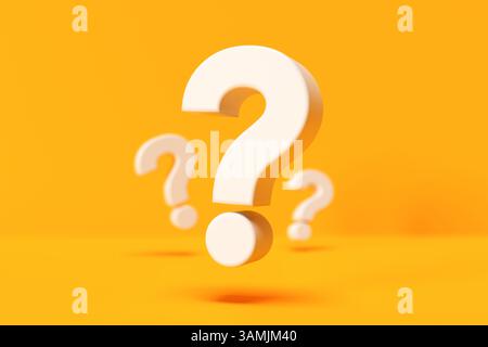 White question marks are floating on a vivid yellow background, creating a visual representation of uncertainty, inquiry, and the search for answers. Stock Photo