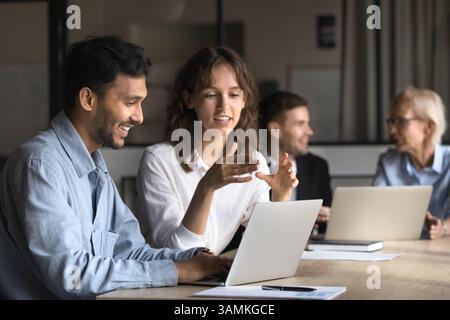 2 professional confident project managers collaborate Stock Photo
