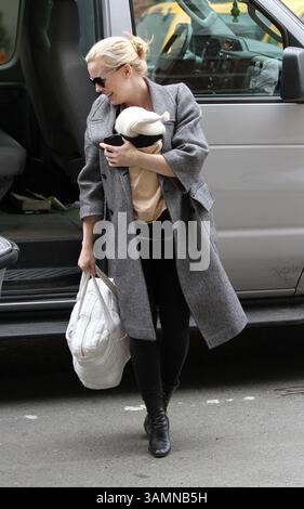 April 1, 2014 - New York City, NY, USA - Actress Melissa George arrives at the set of her newTV pilot with her son RaphaÃ«l Blanc on pril 1 2014 in New York City  (Credit Image: © Zelig Shaul/Ace Pictures/ZUMAPRESS.com) Stock Photo