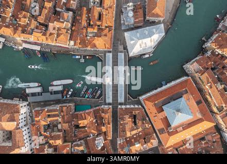 Aerial view of Rialto bridge crossing the Grand Canal in Venice ...