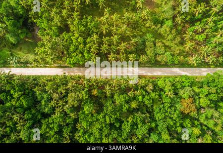 Aerial view of long straight road in Sagbayan, Philippines. Stock Photo