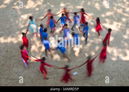 Manikganj, Bangladesh - 19 September 2018: view of kids playing and enjoying free time after school in Manikganj, Bangladesh. Stock Photo