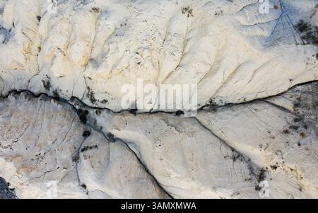 Aerial view of rugged terrain with rock formations and dry desert cracks, Hangrang, Himachal Pradesh, India. Stock Photo