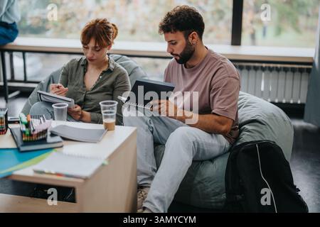 Students collaborating on academic project in a modern study space Stock Photo