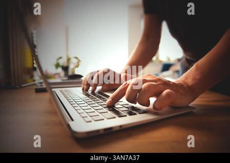 Man using laptop, close up, businessman at work Stock Photo