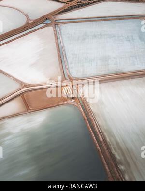 Aerial view of colorful salt marshes with geometric patterns and ...